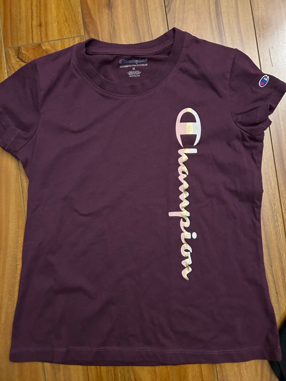 Champion Short-Sleeve Tee in Plum with Iridescent Logo Kid’s size m
